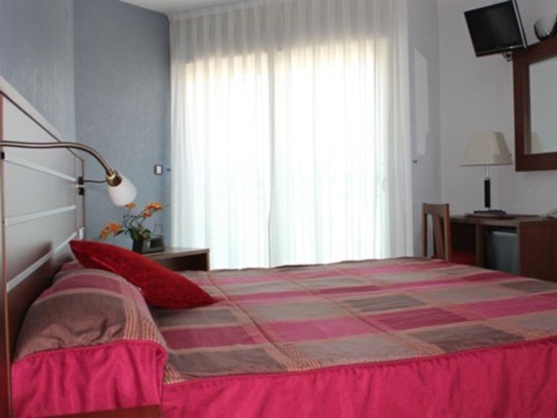 Hotel La Familia Gallo Rojo